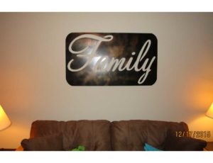 This Family metal art message is at the center of all activities.