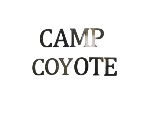 camp coyote metal sign
